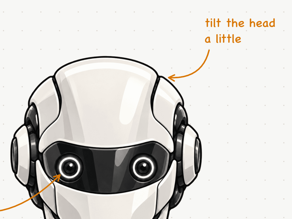 Close-up of a DEX Zero board: an amber handwriting-style note, “tilt the head a little,” with an arrow to the top of a robot illustration’s head.